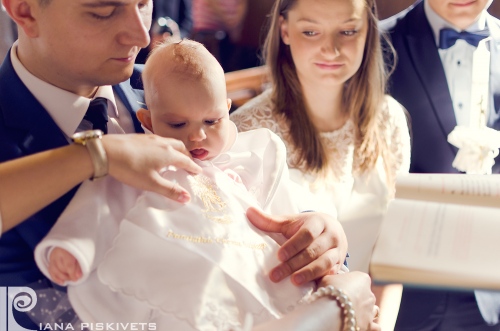 Present at the christening. Photographer in Warsaw. The ceremony of baptism Piaseczno.